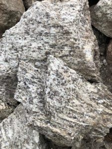 Spodumene in dyke hosted by pegmatite